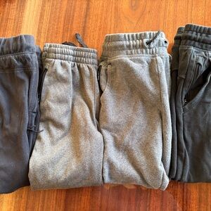 Four pairs of boys joggers